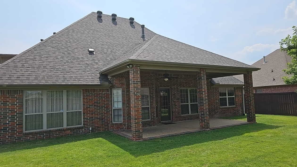 Brick ranch home in Central Arkansas with a new asphalt shingle roof