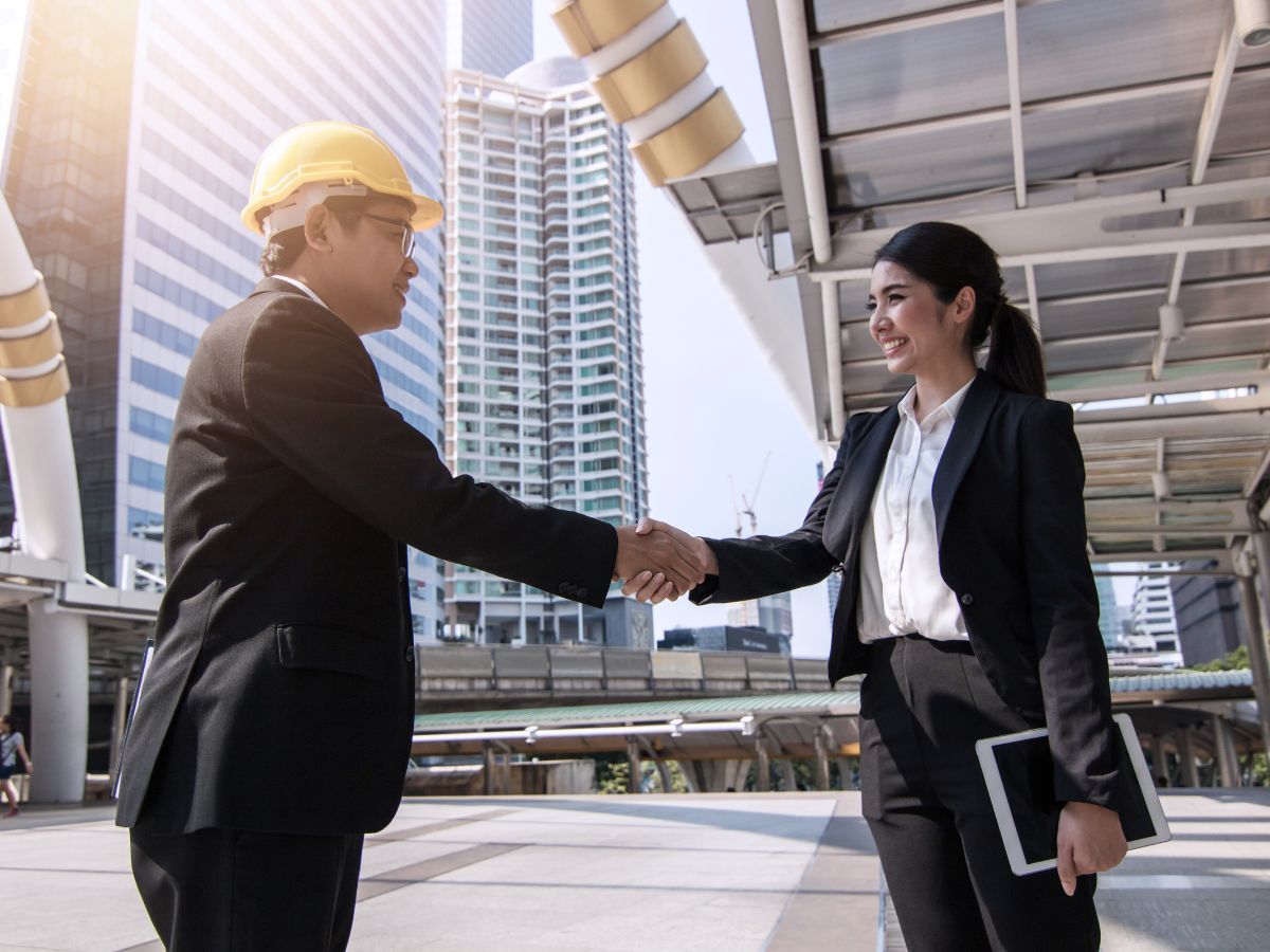 Business deal sealed for commercial metal roofing project