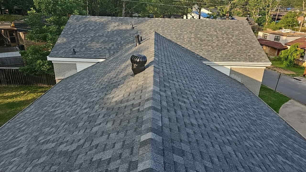 Completed asphalt shingle roof with ridge cap