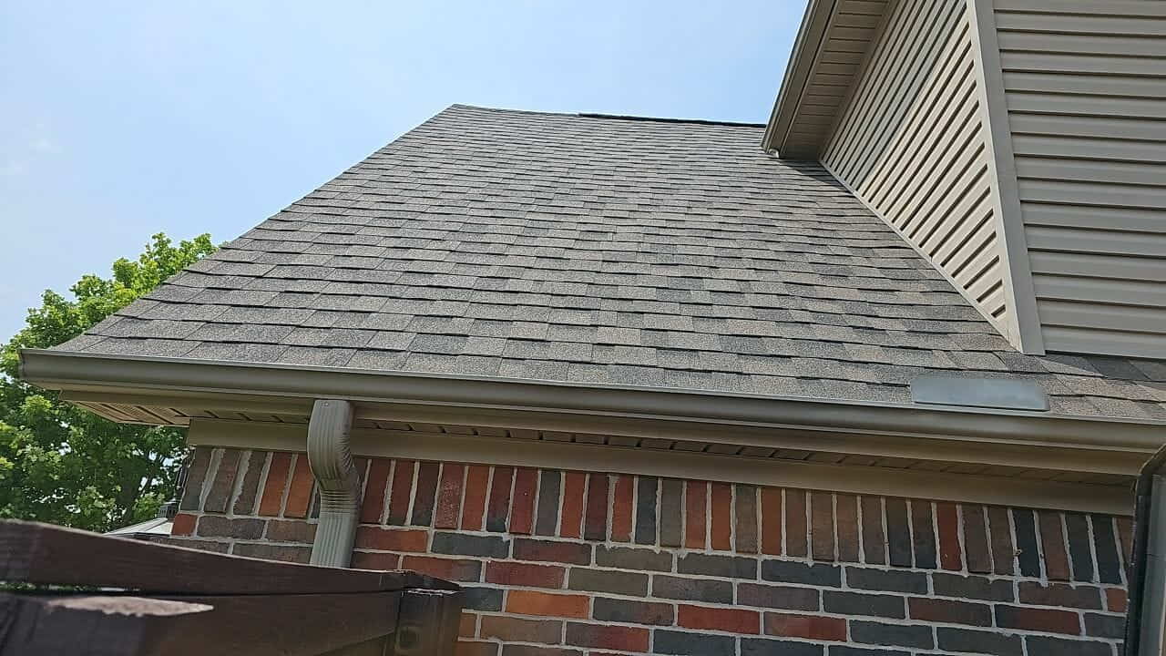 Close-up of a completed asphalt shingle roof